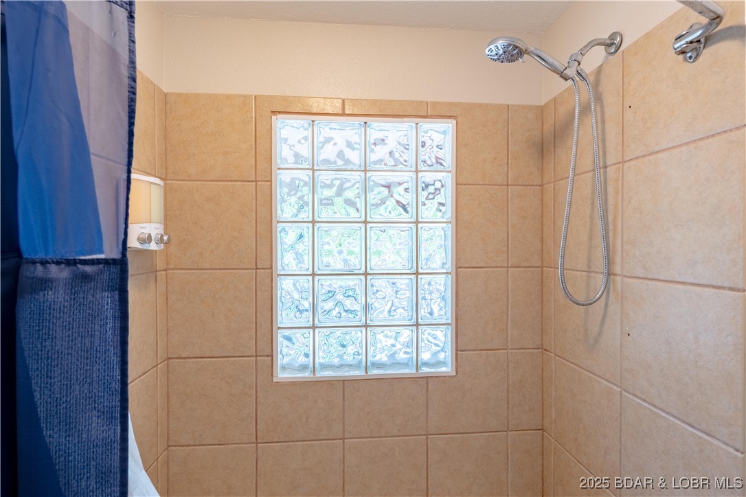 32 Lake Village Road Eldon, MO 65026 - Photo 16 of 49 Tiled bath