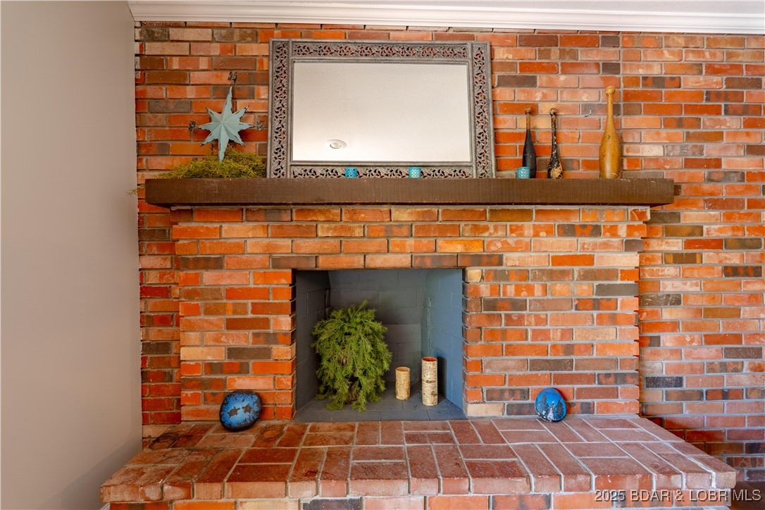 32 Lake Village Road Eldon, MO 65026 - Photo 21 of 49 Lower level fireplace