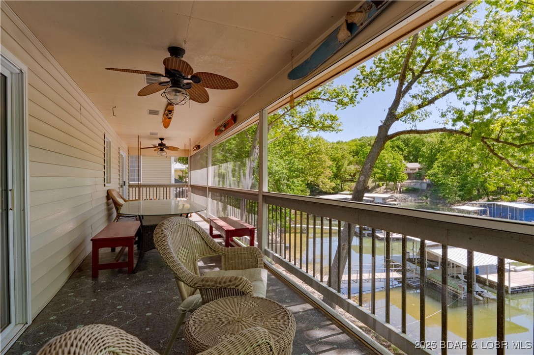 32 Lake Village Road Eldon, MO 65026 - Photo 35 of 49 Screened deck