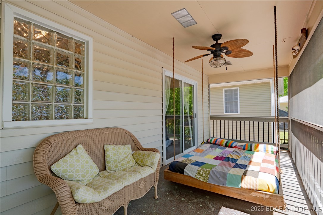 32 Lake Village Road Eldon, MO 65026 - Photo 36 of 49 Screened deck