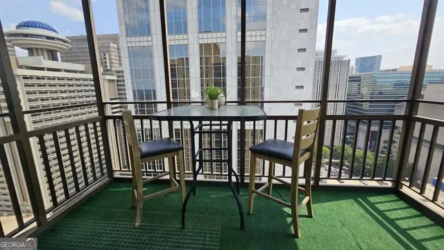 a view of a chairs in the deck