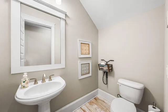 a kitchen with granite countertop a stove and a refrigerator