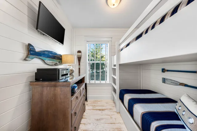 a view of a backyard with sitting area and garden