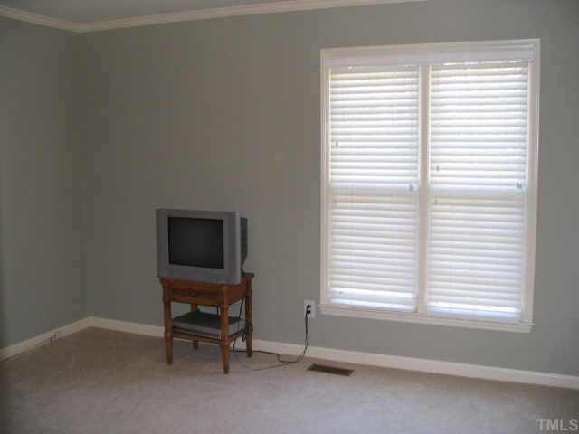 7500 Old Hundred Road Raleigh, NC 27613 - Photo 7 of 9 a view of a workspace with a window and a chair