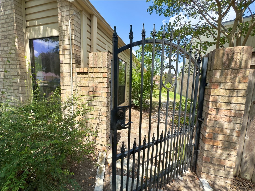 2611 Rustling Oaks Drive Bryan, TX 77802 - Photo 41 of 43 a view of a balcony with a tree