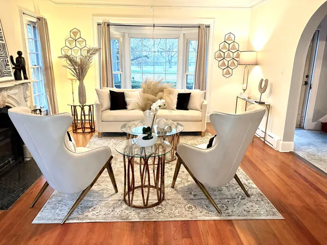 a living room with furniture and a table