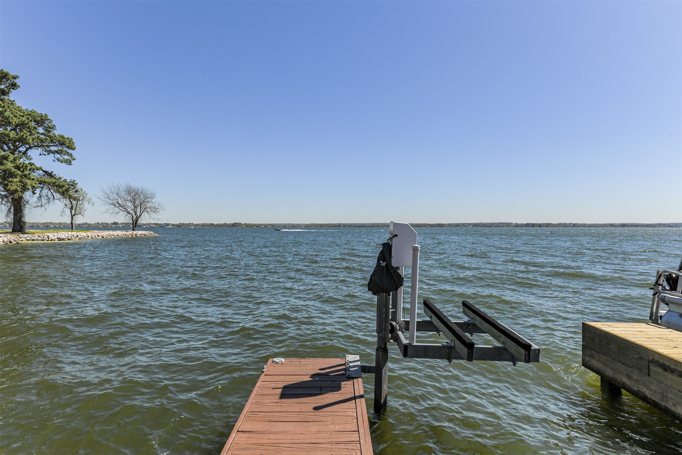 801 River Road, Unit 106F Montgomery, TX 77356 - Photo 33 of 39 Another view of the JetSki lift in this quiet little cove...