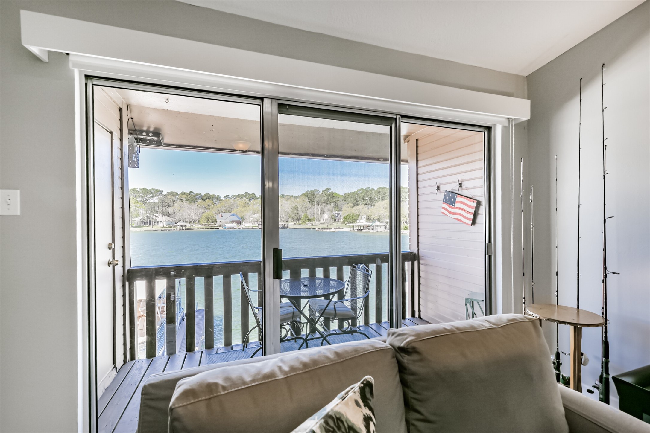 801 River Road, Unit 106F Montgomery, TX 77356 - Photo 4 of 39 Views of the cover from living room & kitchen through glass sliders