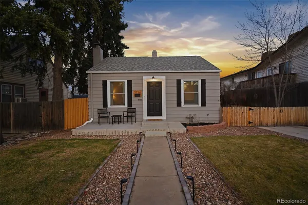 a house with garden in front of it