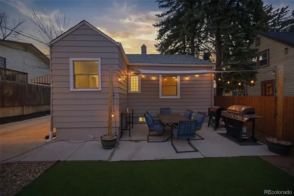 a view of a backyard of the house