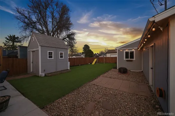 a view of a backyard with plants