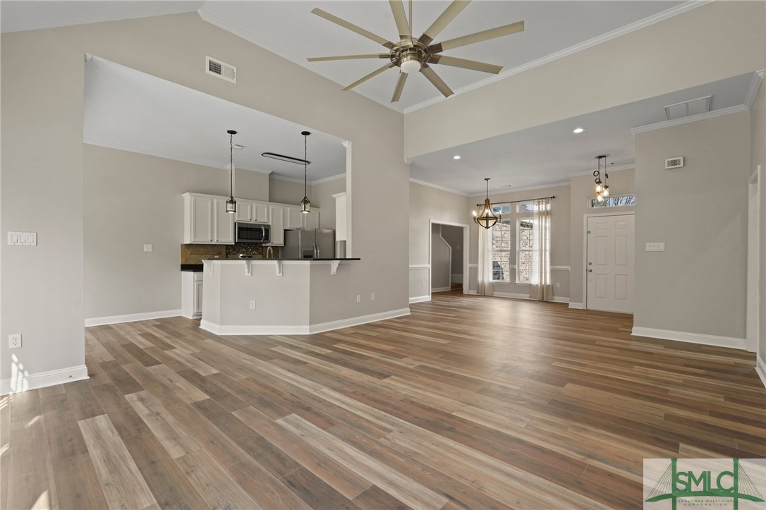 210 Burton Road Savannah, GA 31405 - Photo 10 of 48 Great Room open to dining room, kitchen and eat-in