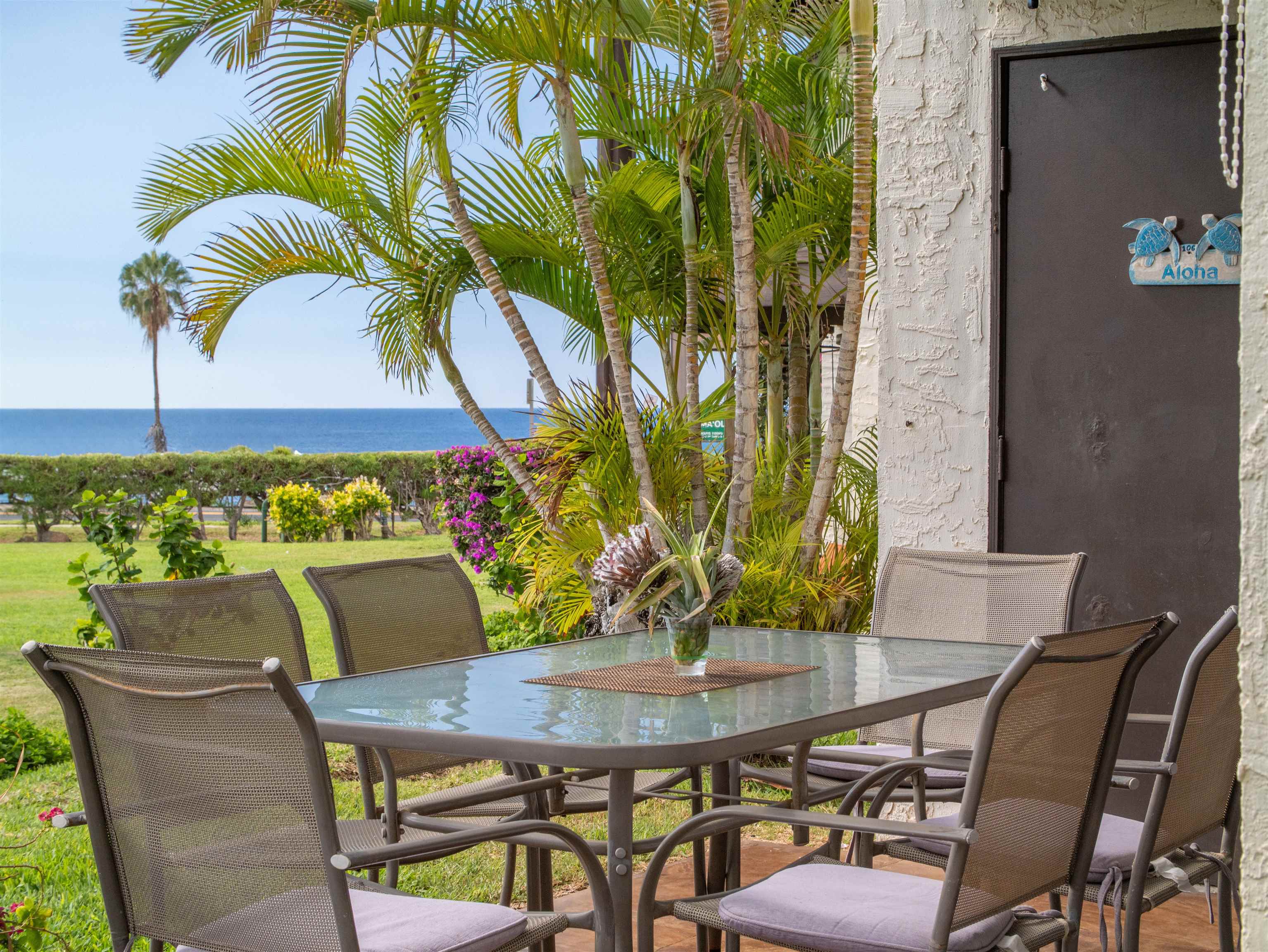 2737 South Kihei Road, Unit 1106 Kihei, HI 96753 - Photo 11 of 25 a view of a chairs and table in patio