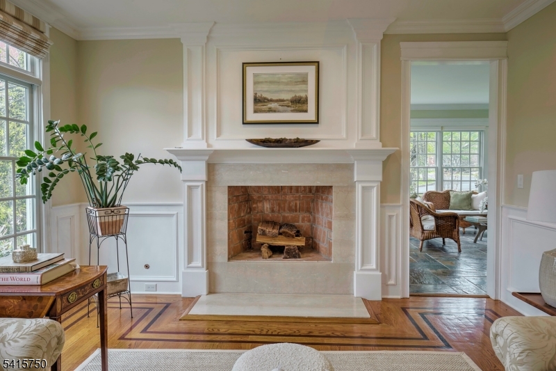 85 Mosle Road Peapack-Gladstone, NJ 07931 - Photo 15 of 49 a living room with furniture and a fireplace