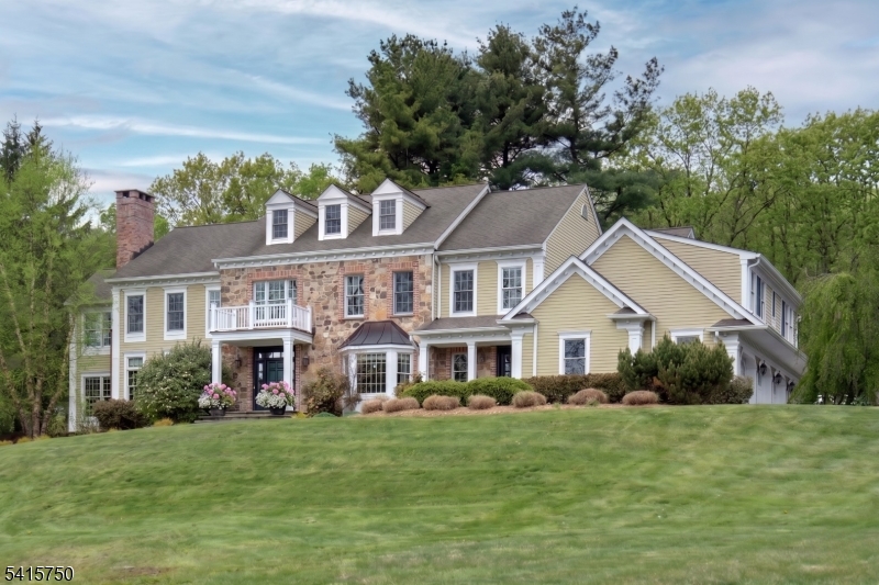 85 Mosle Road Peapack-Gladstone, NJ 07931 - Photo 2 of 49 a front view of a house with a garden