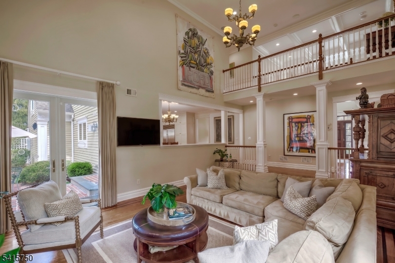 85 Mosle Road Peapack-Gladstone, NJ 07931 - Photo 21 of 49 a living room with furniture and a flat screen tv