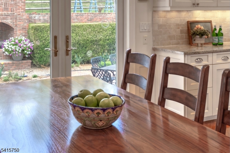 85 Mosle Road Peapack-Gladstone, NJ 07931 - Photo 23 of 49 a view of a dining room with furniture window and wooden floor
