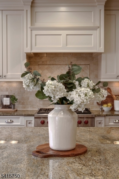 85 Mosle Road Peapack-Gladstone, NJ 07931 - Photo 26 of 49 a vase of flowers sitting on a table
