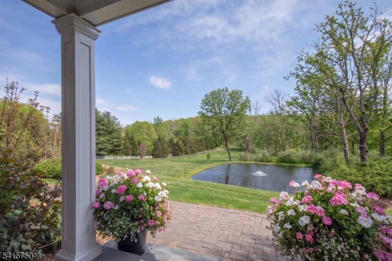 85 Mosle Road Peapack-Gladstone, NJ 07931 - Photo 5 of 49 a view of a garden with a flower garden