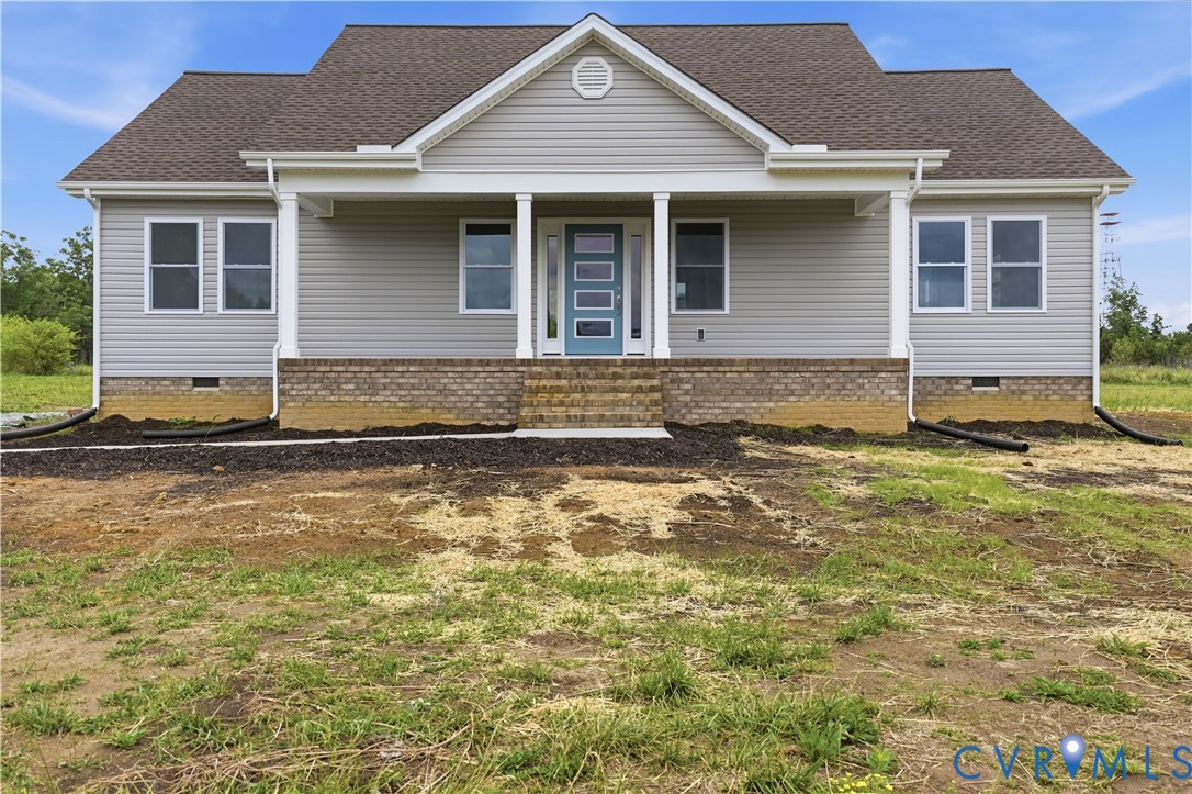 7839 King William Road Aylett, VA 23009 - Photo 1 of 38 a front view of a house with a yard
