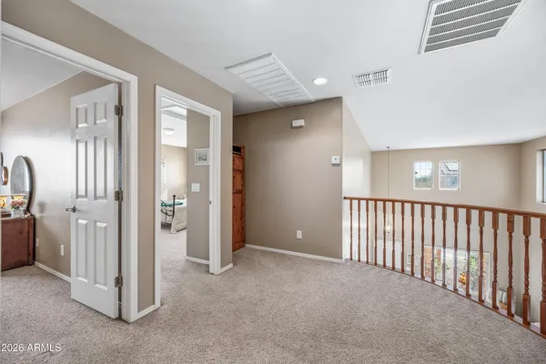a view of a livingroom with workspace and a couch