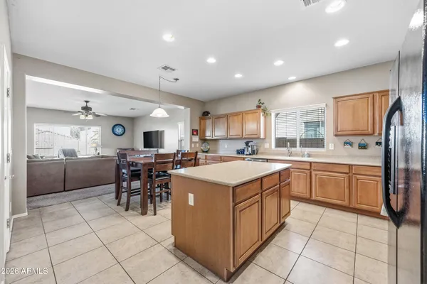 a view of a livingroom with furniture and windows