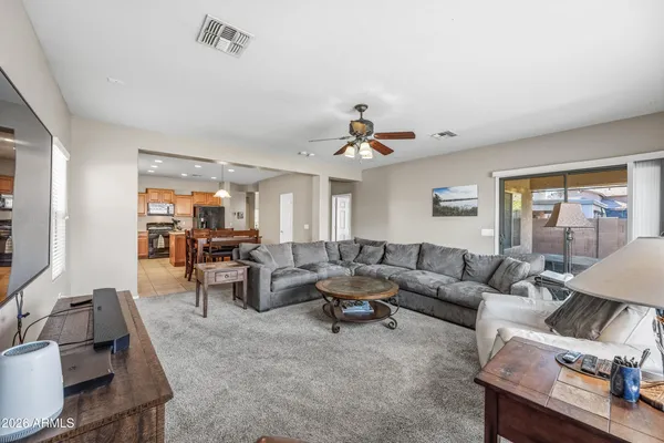 a view of a living room and dining room