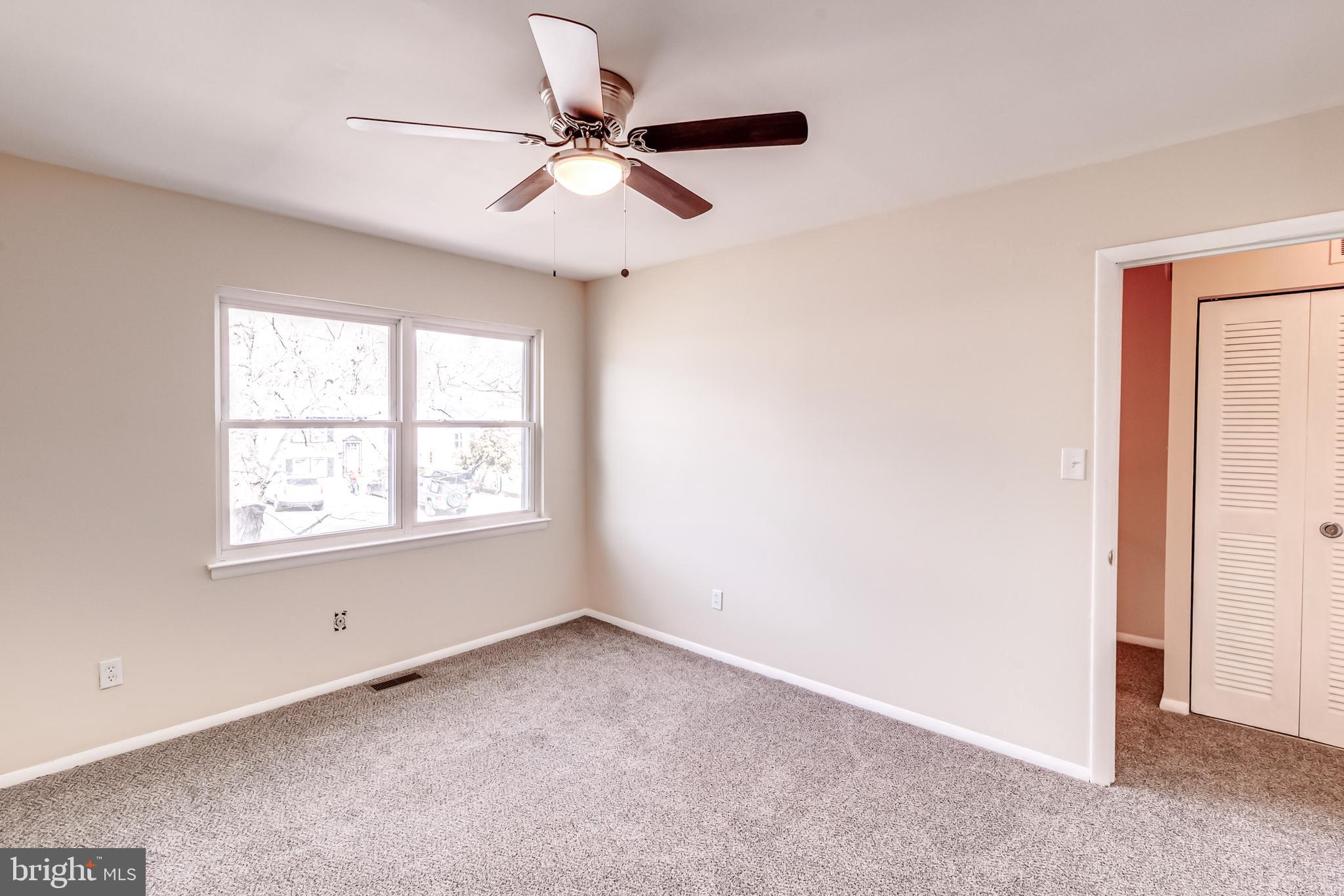 982 Topview Drive Edgewood, MD 21040 - Photo 14 of 25 an empty room with a window and a fan