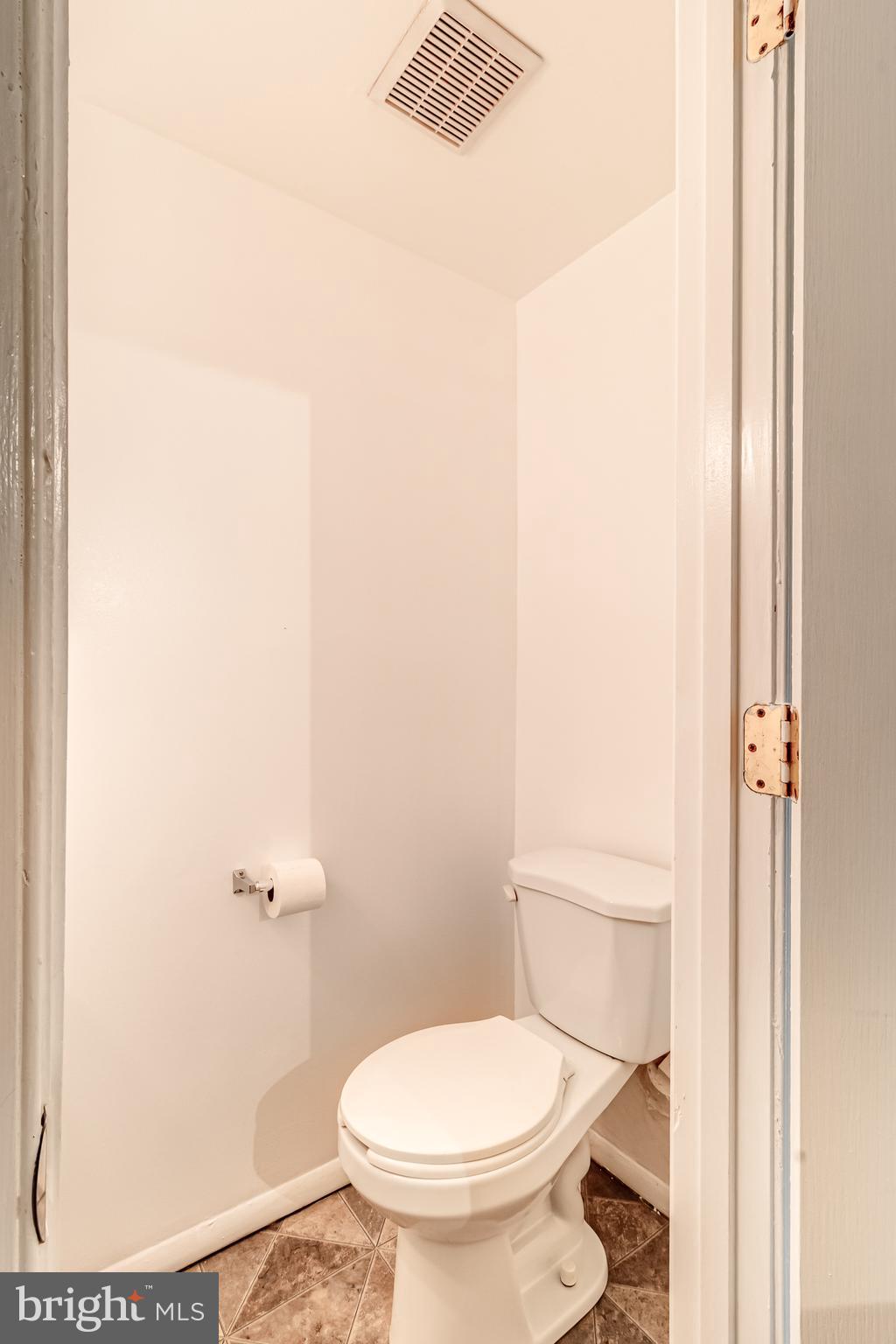 982 Topview Drive Edgewood, MD 21040 - Photo 10 of 25 a white toilet sitting next to a shower