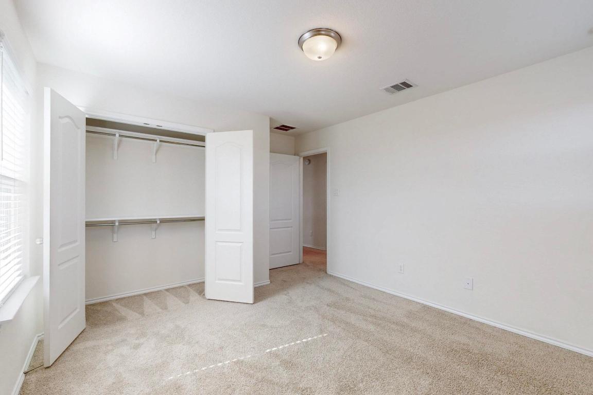 17308 Crazy Arm Road Round Rock, TX 78664 - Photo 15 of 22 an empty room with closet
