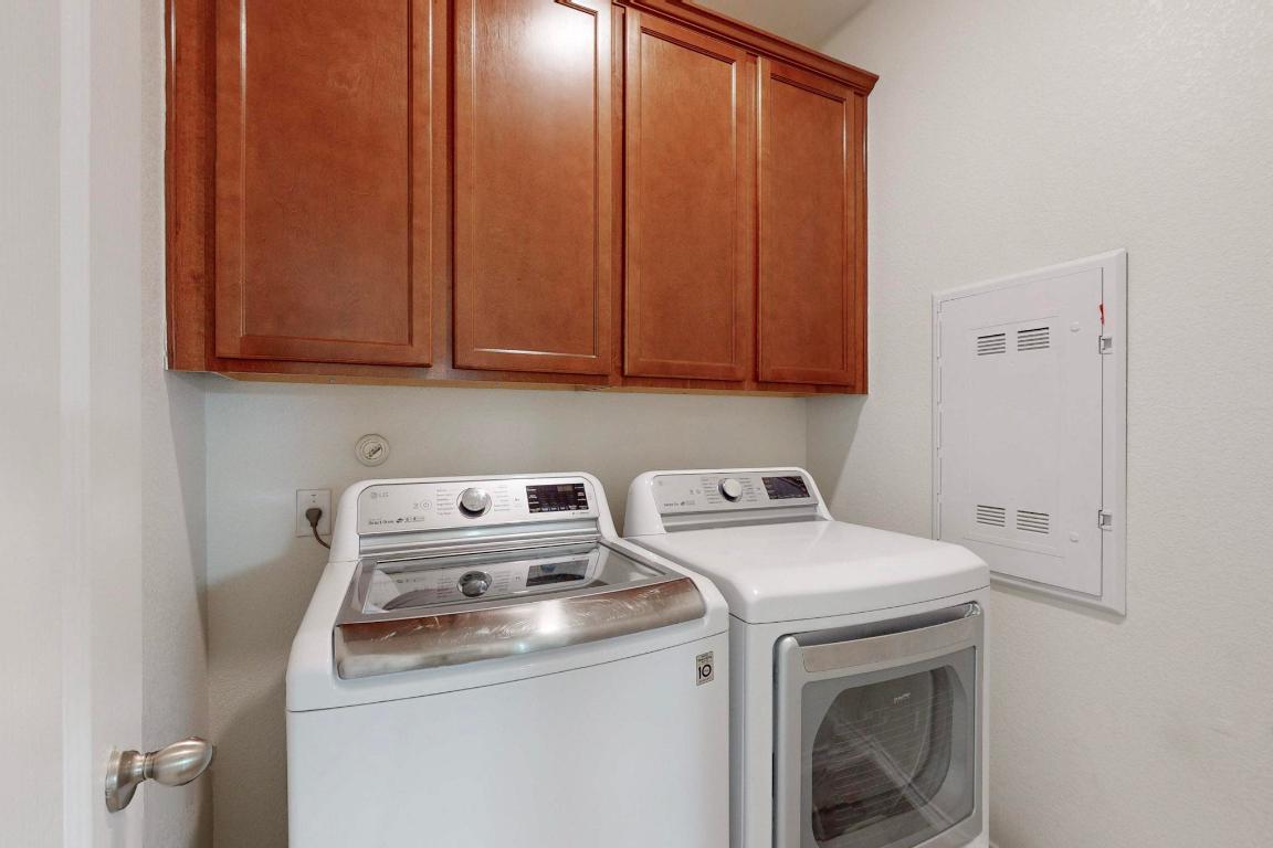 17308 Crazy Arm Road Round Rock, TX 78664 - Photo 17 of 22 a utility room with dryer and washer