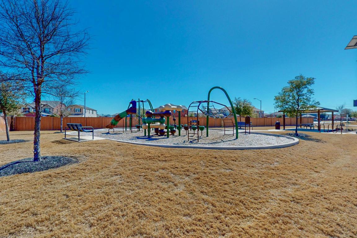 17308 Crazy Arm Road Round Rock, TX 78664 - Photo 21 of 22 a view of a park with swings and slides