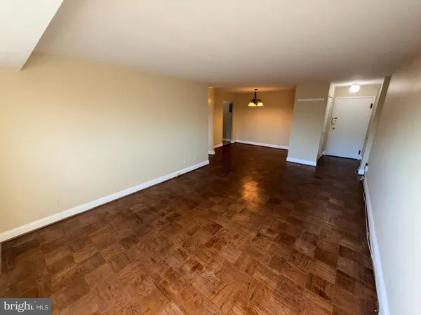 a view of a big room with wooden floor
