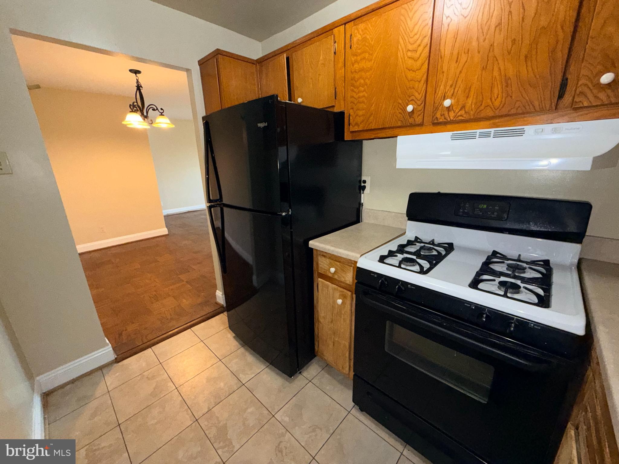 575 Thayer Avenue, Unit 703 Silver Spring, MD 20910 - Photo 5 of 9 Cozy kitchen.