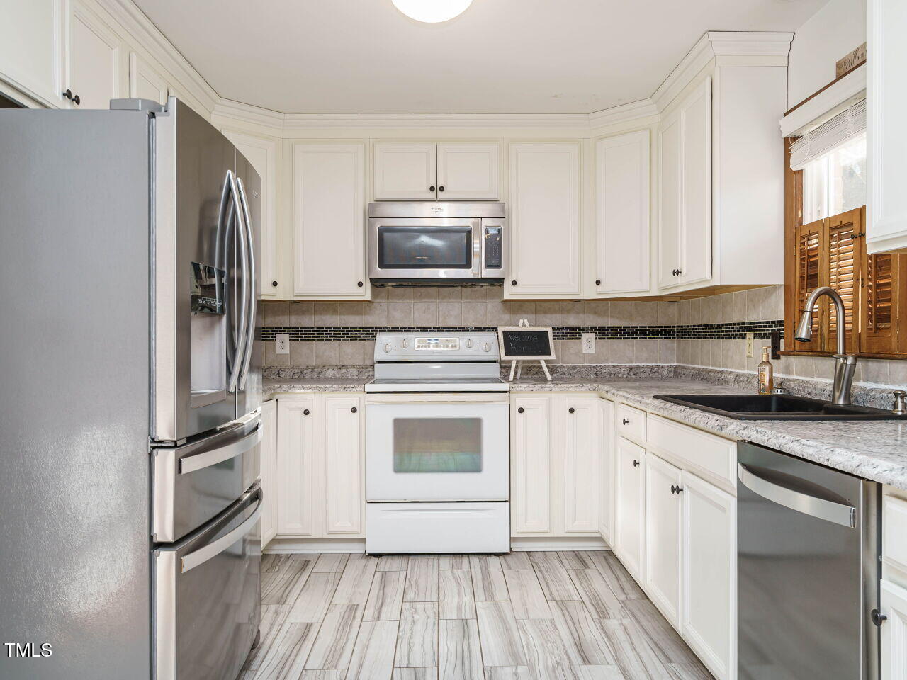 1411 Vandora Springs Road Garner, NC 27529 - Photo 12 of 29 014-1280x960-kitchen