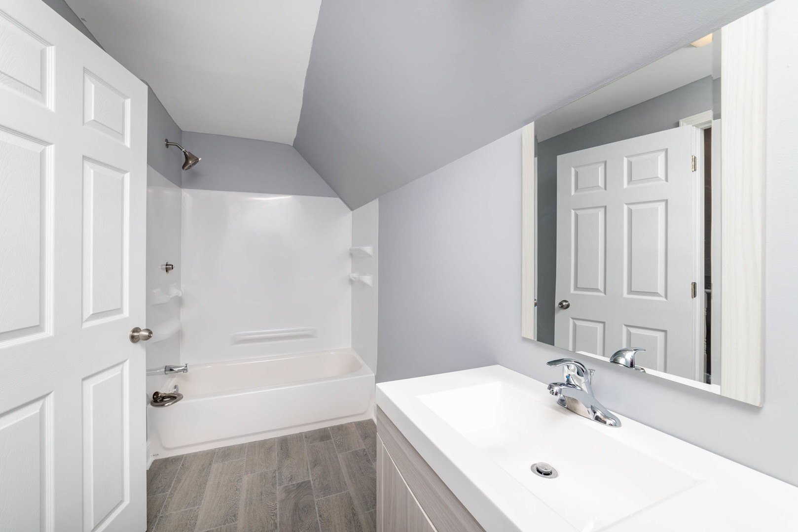 404 Garfield Road Harvard, IL 60033 - Photo 18 of 30 a bathroom with a sink and a mirror