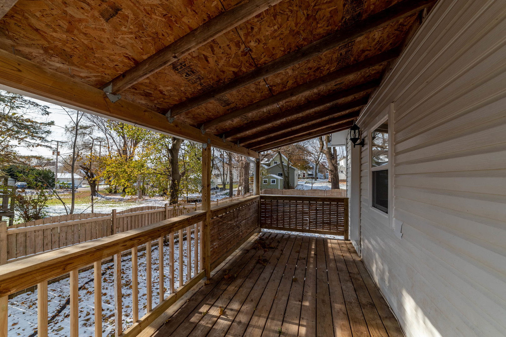 404 Garfield Road Harvard, IL 60033 - Photo 26 of 30 a view of balcony with wooden floor