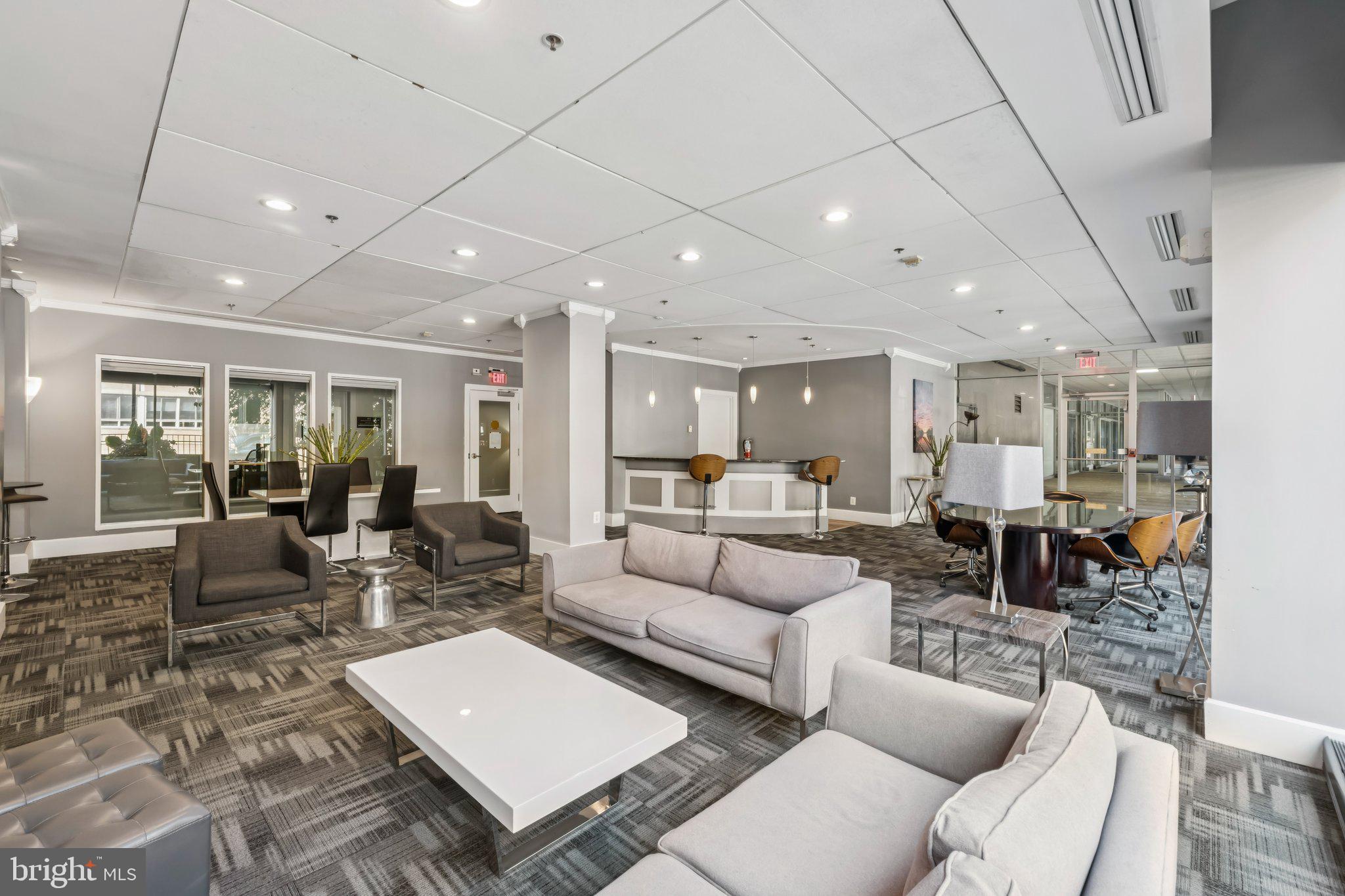 800 4th Street Southwest, Unit 121S Washington, DC 20024 - Photo 16 of 23 a living room with furniture and a table