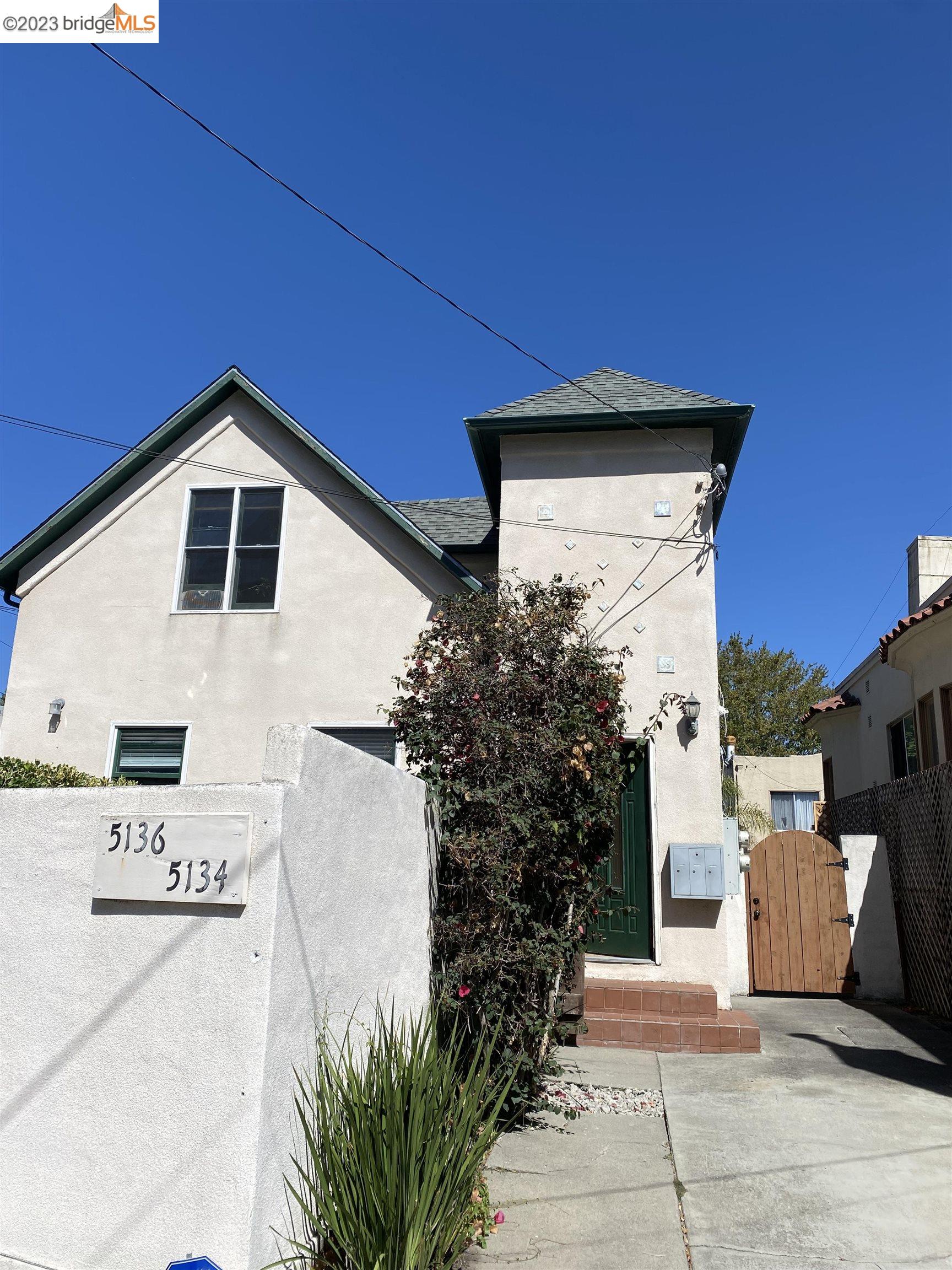 Rockridge Oakland, CA 94609 - Photo 1 of 31 a front view of a house with a yard