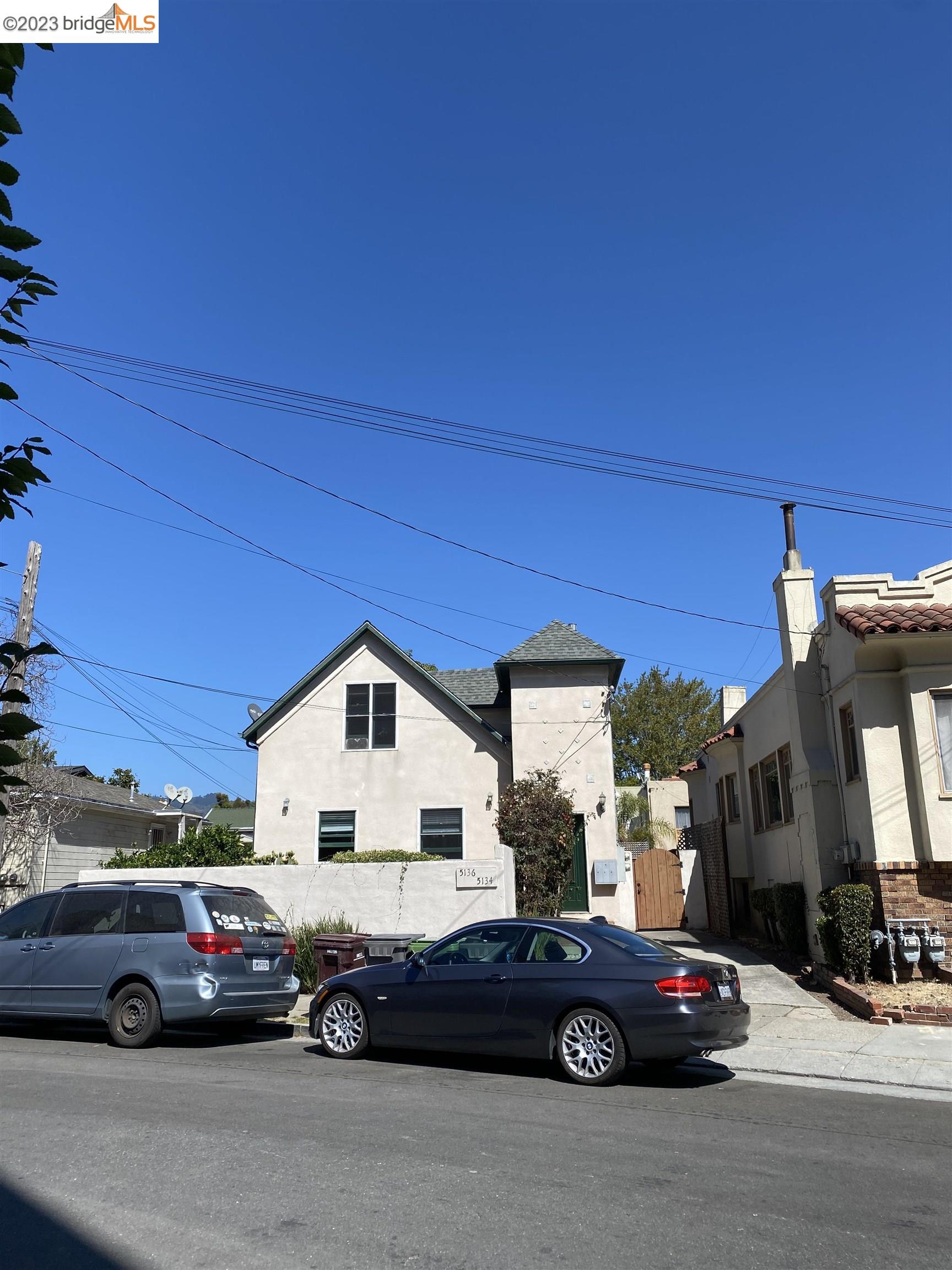 Rockridge Oakland, CA 94609 - Photo 2 of 31 a car parked in front of a house