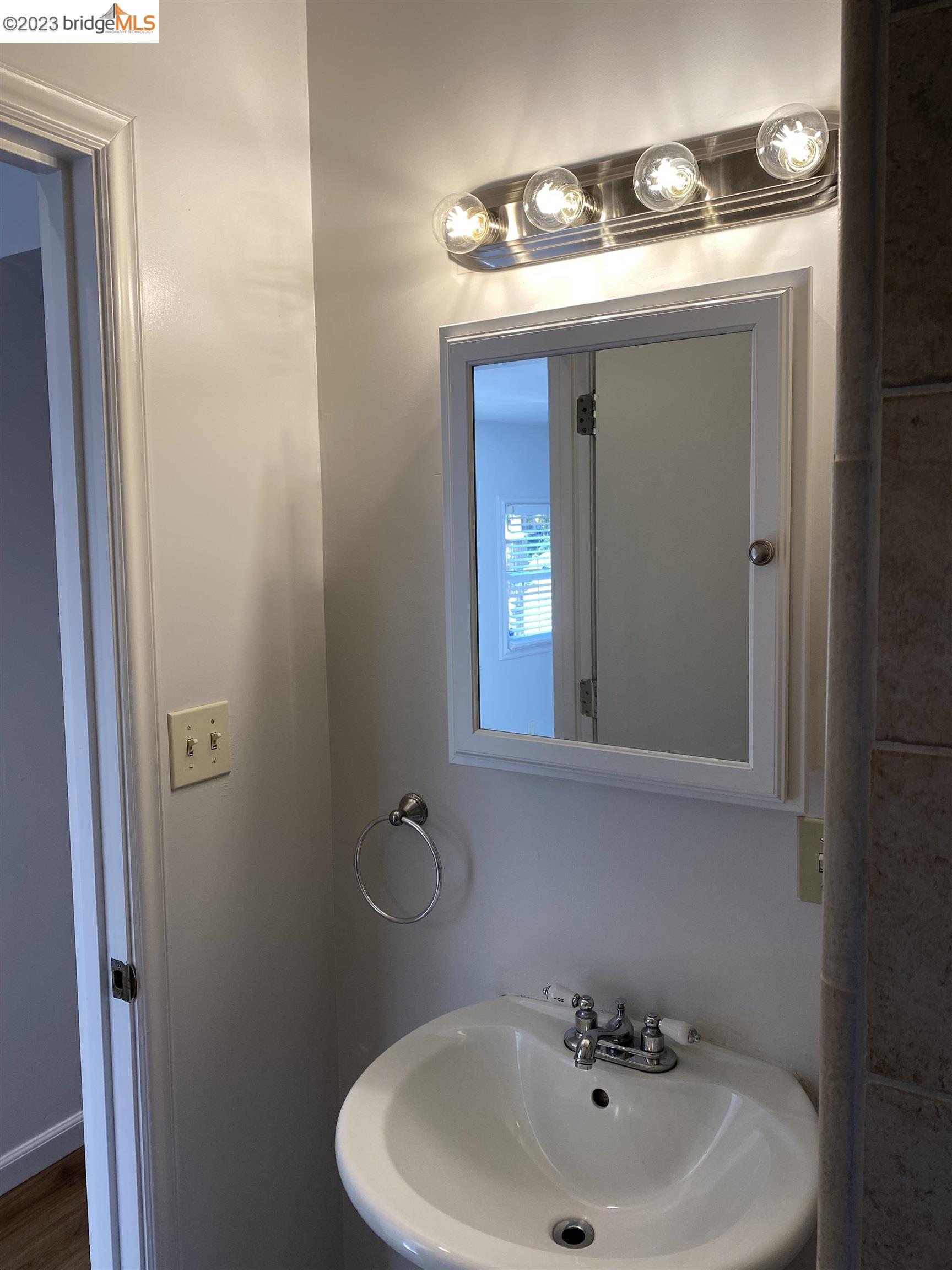 Rockridge Oakland, CA 94609 - Photo 23 of 31 a bathroom with a sink and a mirror