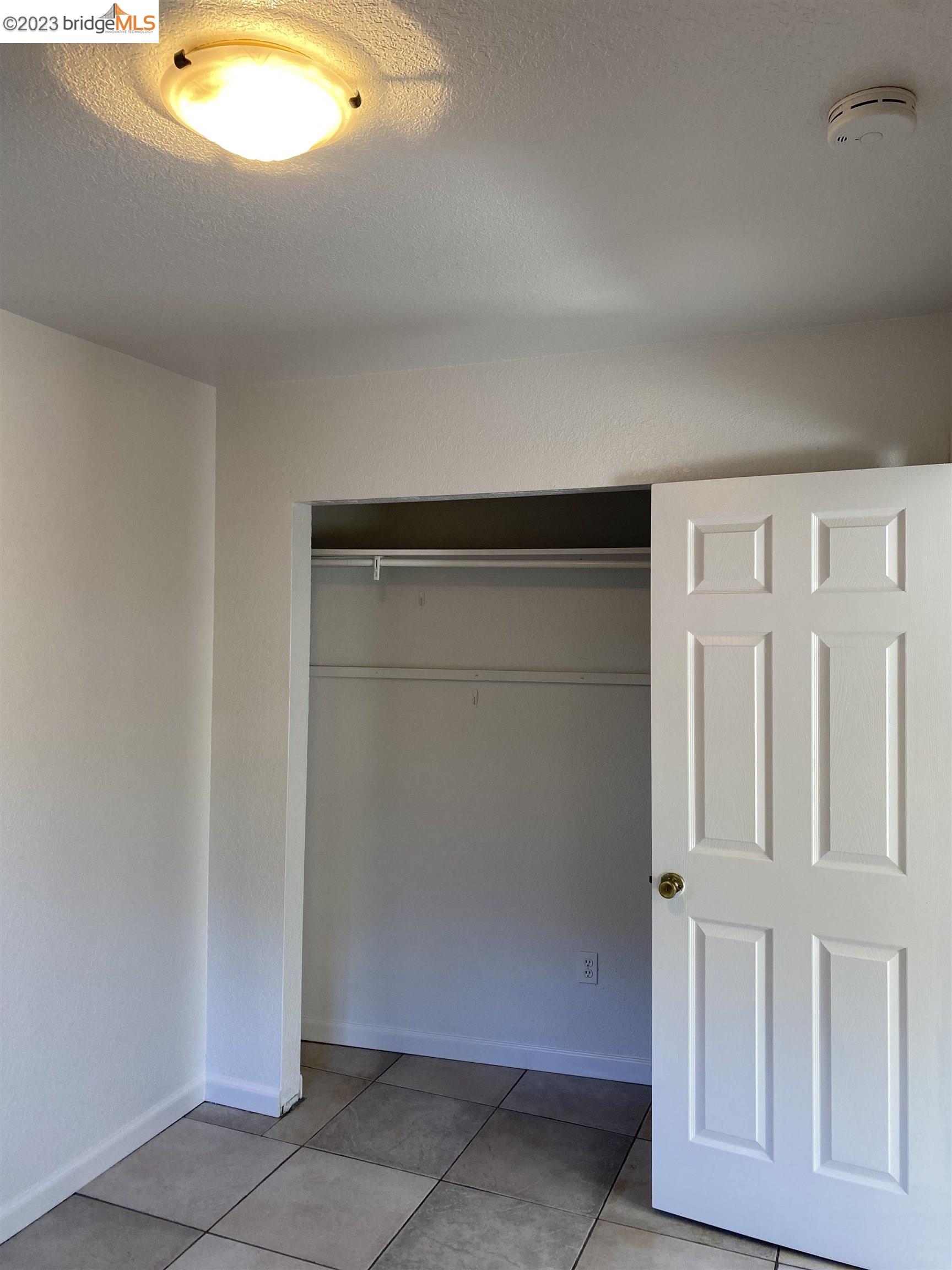 Rockridge Oakland, CA 94609 - Photo 30 of 31 a room with a bench and cabinet