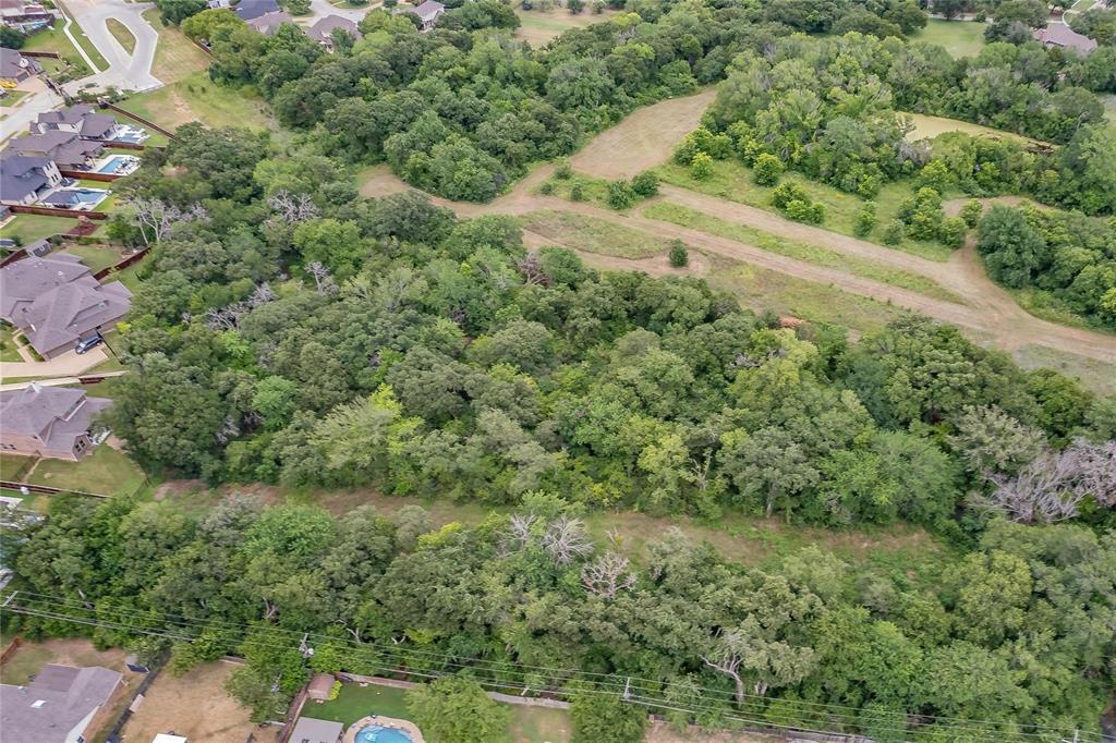 4001 Curry Road Arlington, TX 76001 - Photo 14 of 31 an aerial view of residential houses with outdoor space and trees