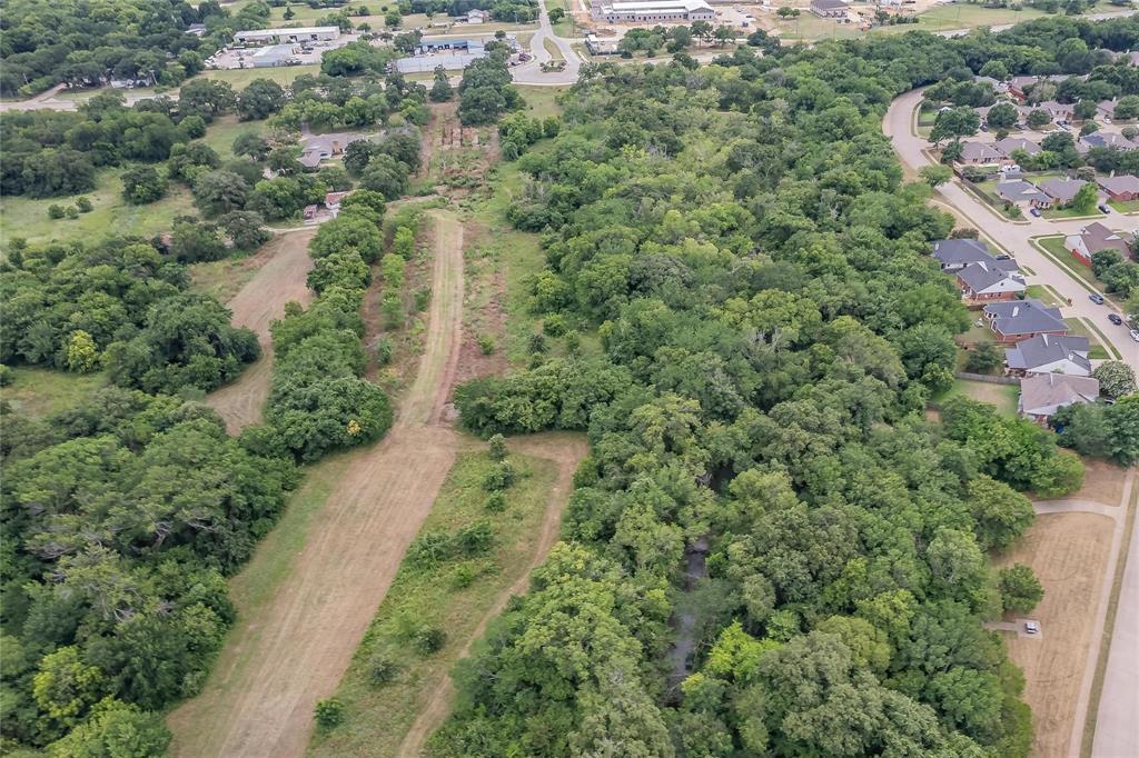 4001 Curry Road Arlington, TX 76001 - Photo 17 of 31 an aerial view of residential houses with outdoor space and trees