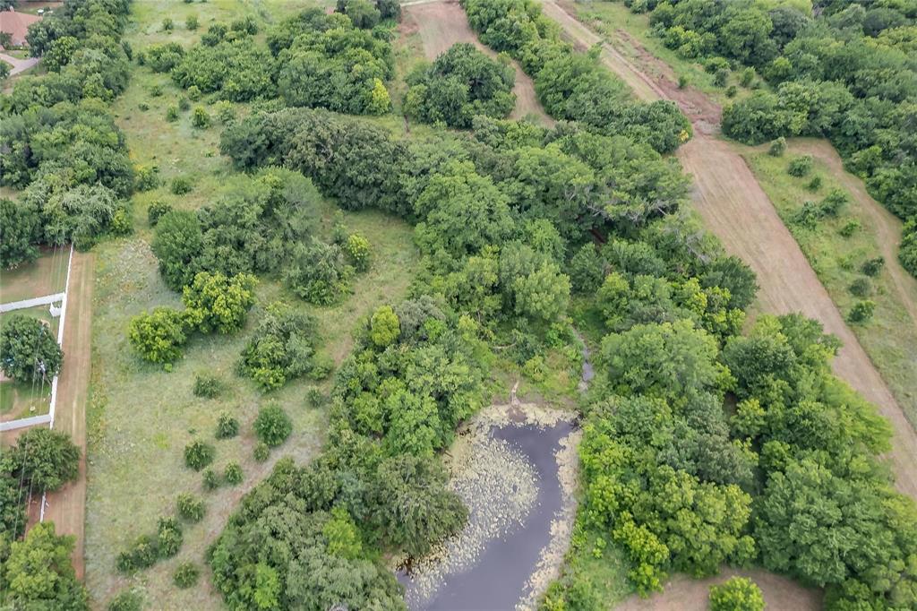 4001 Curry Road Arlington, TX 76001 - Photo 18 of 31 an aerial view of a house with a yard