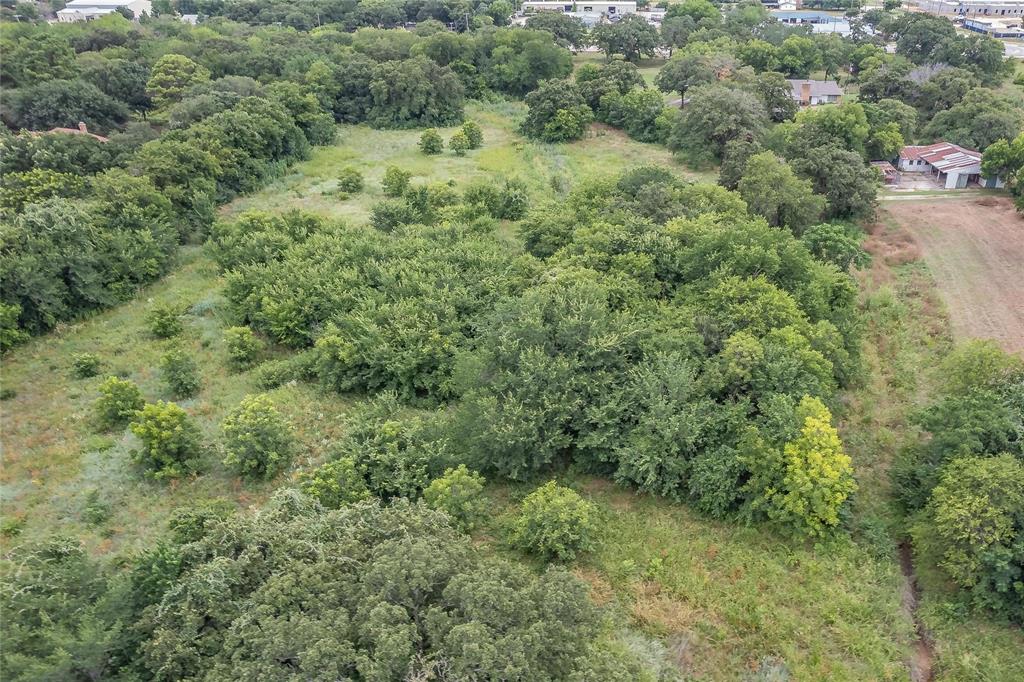4001 Curry Road Arlington, TX 76001 - Photo 19 of 31 an aerial view of a forest with houses