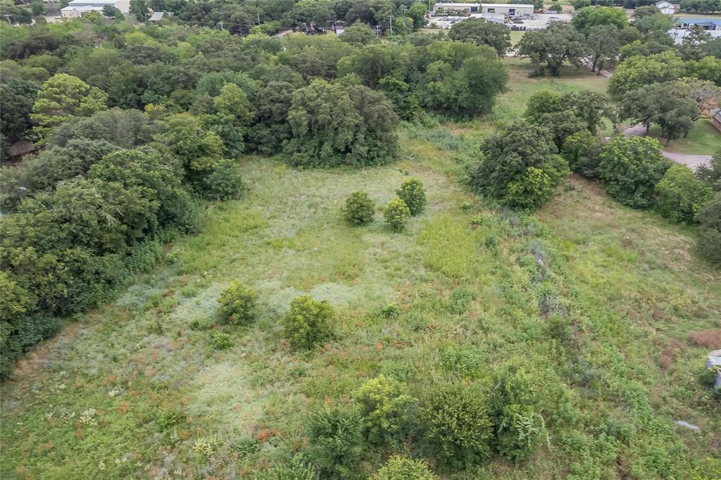 4001 Curry Road Arlington, TX 76001 - Photo 20 of 31 an aerial view of a house with a yard
