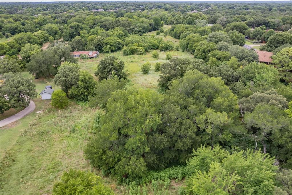 4001 Curry Road Arlington, TX 76001 - Photo 21 of 31 an aerial view of residential houses with outdoor space and trees