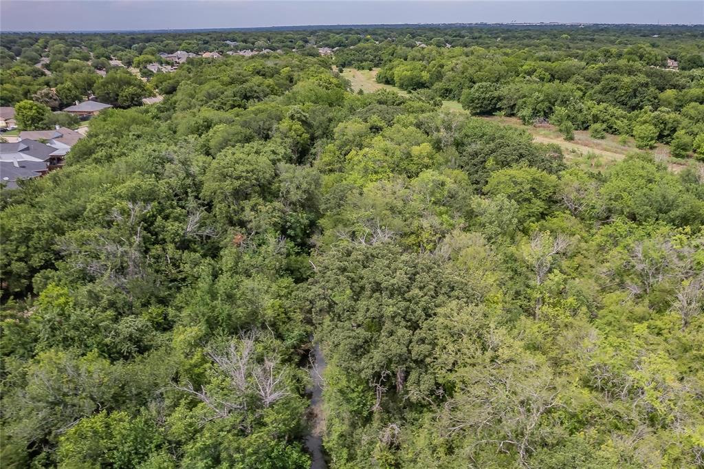 4001 Curry Road Arlington, TX 76001 - Photo 25 of 31 an aerial view of a house with a yard