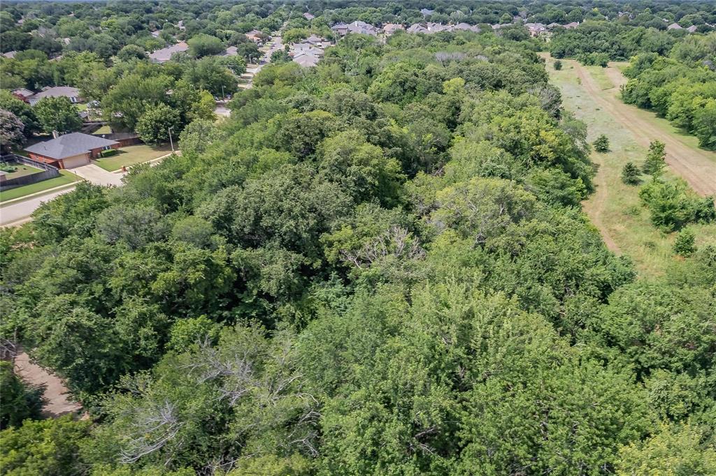4001 Curry Road Arlington, TX 76001 - Photo 26 of 31 an aerial view of a house with a yard